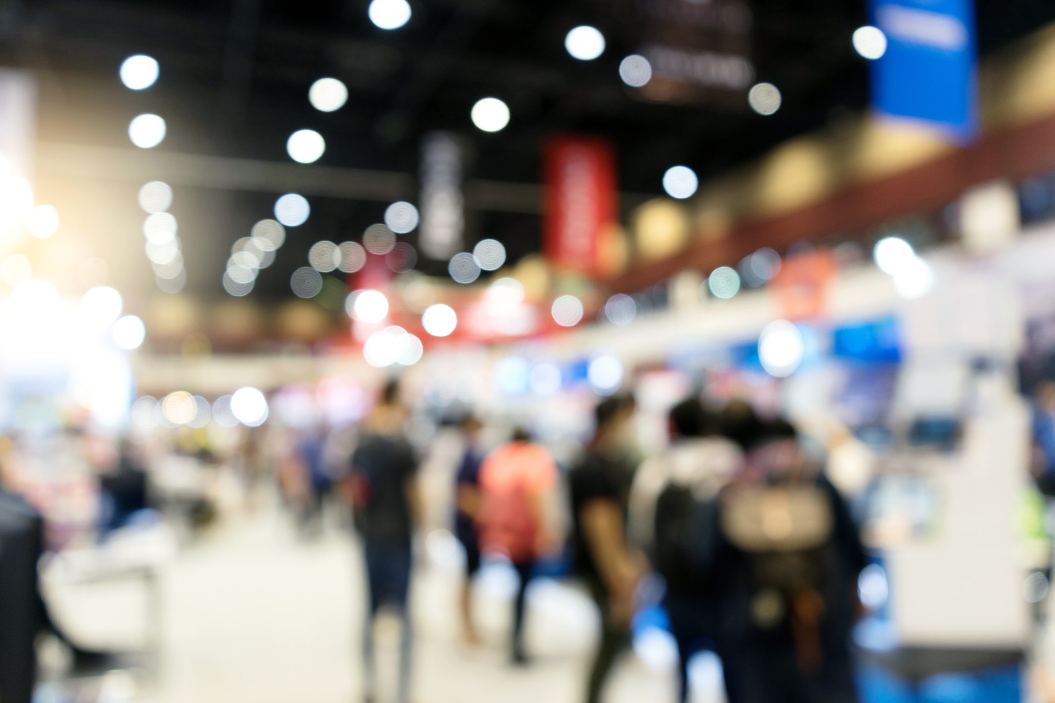 Defocused Image Of People In Illuminated Store